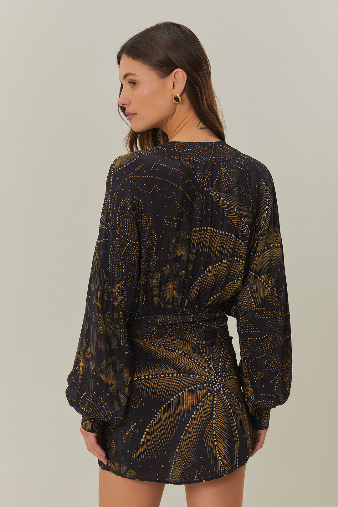 FARM Rio model wearing the Golden Foliage Black Mini Dress Puffy Sleeve