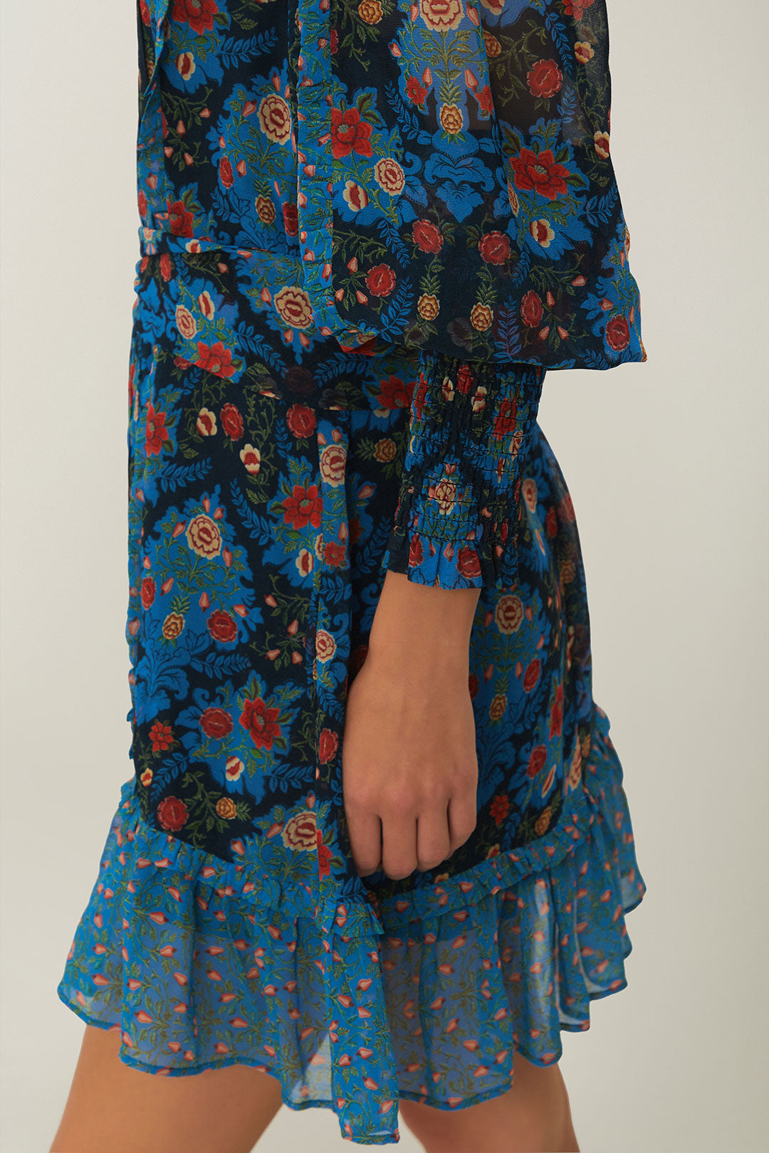FARM Rio model wearing the Blue Arabesque Floral High Neck Mini Dress