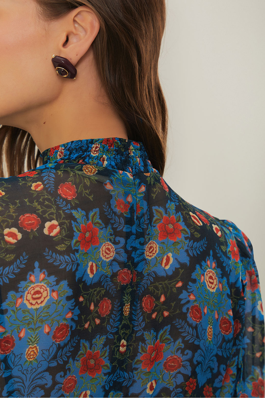 FARM Rio model wearing the Blue Arabesque Floral High Neck Mini Dress