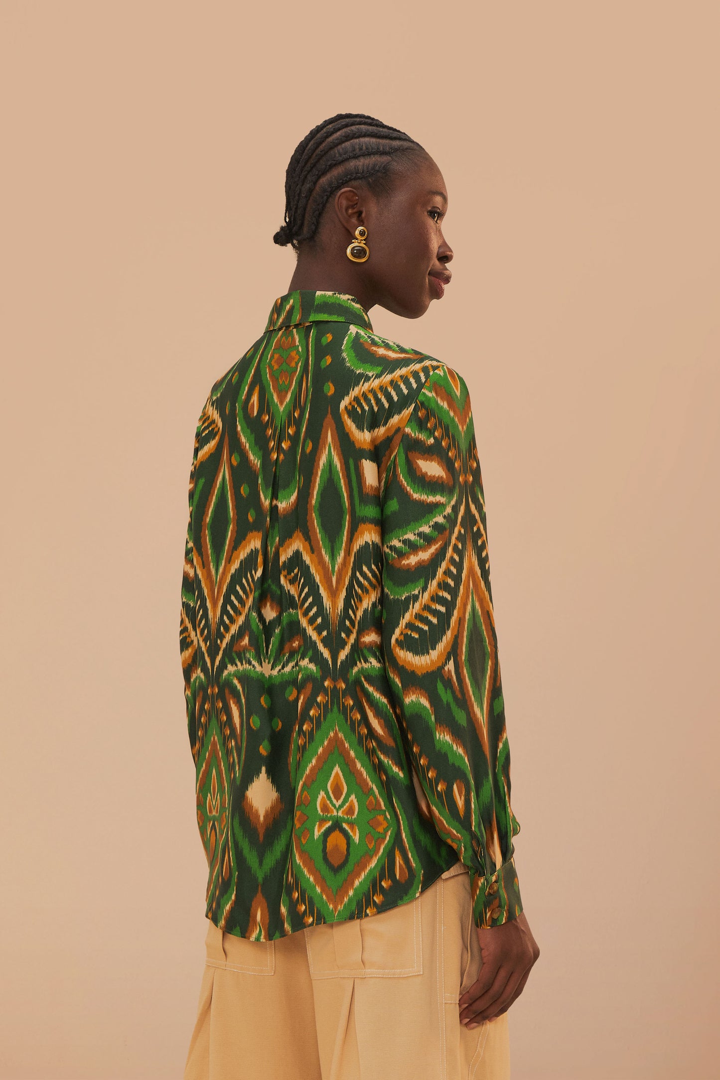 FARM Rio model wearing the Pineapple Ikat Green Shirt