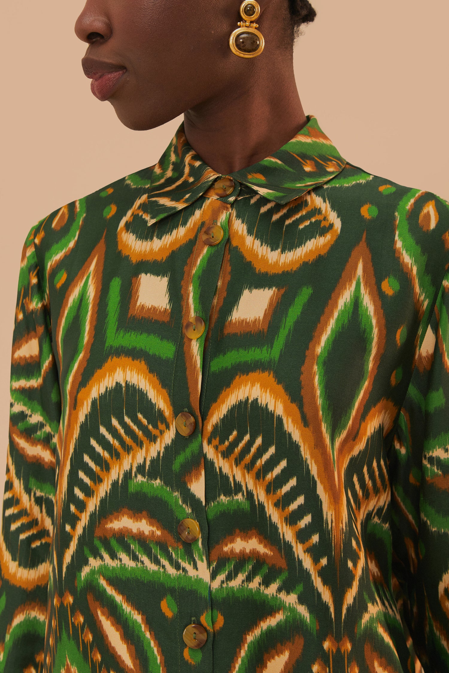 FARM Rio model wearing the Pineapple Ikat Green Shirt