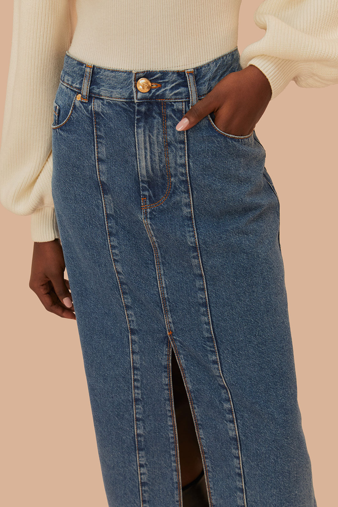 FARM Rio model wearing the Midi Denim Skirt Low Waist