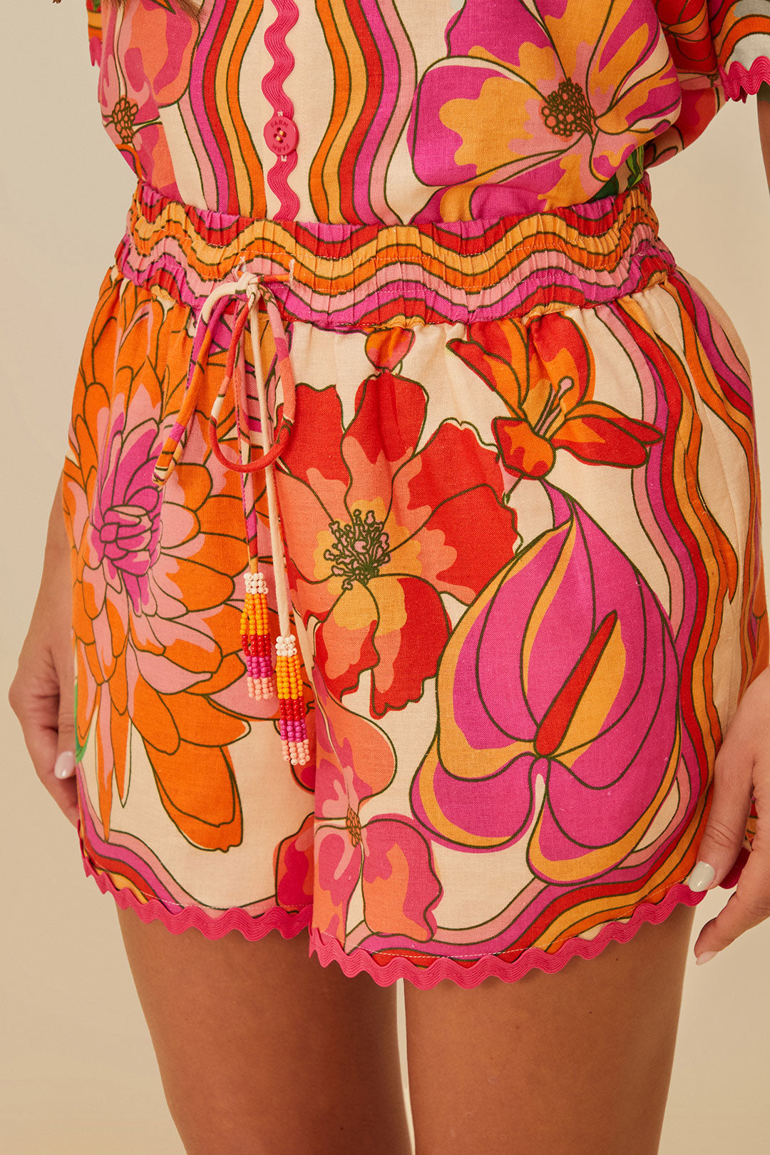 FARM Rio model wearing the Spring Affair Beige Shorts