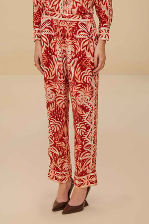 FARM Rio model wearing the Tropical Tapestry Red Pajama Pants