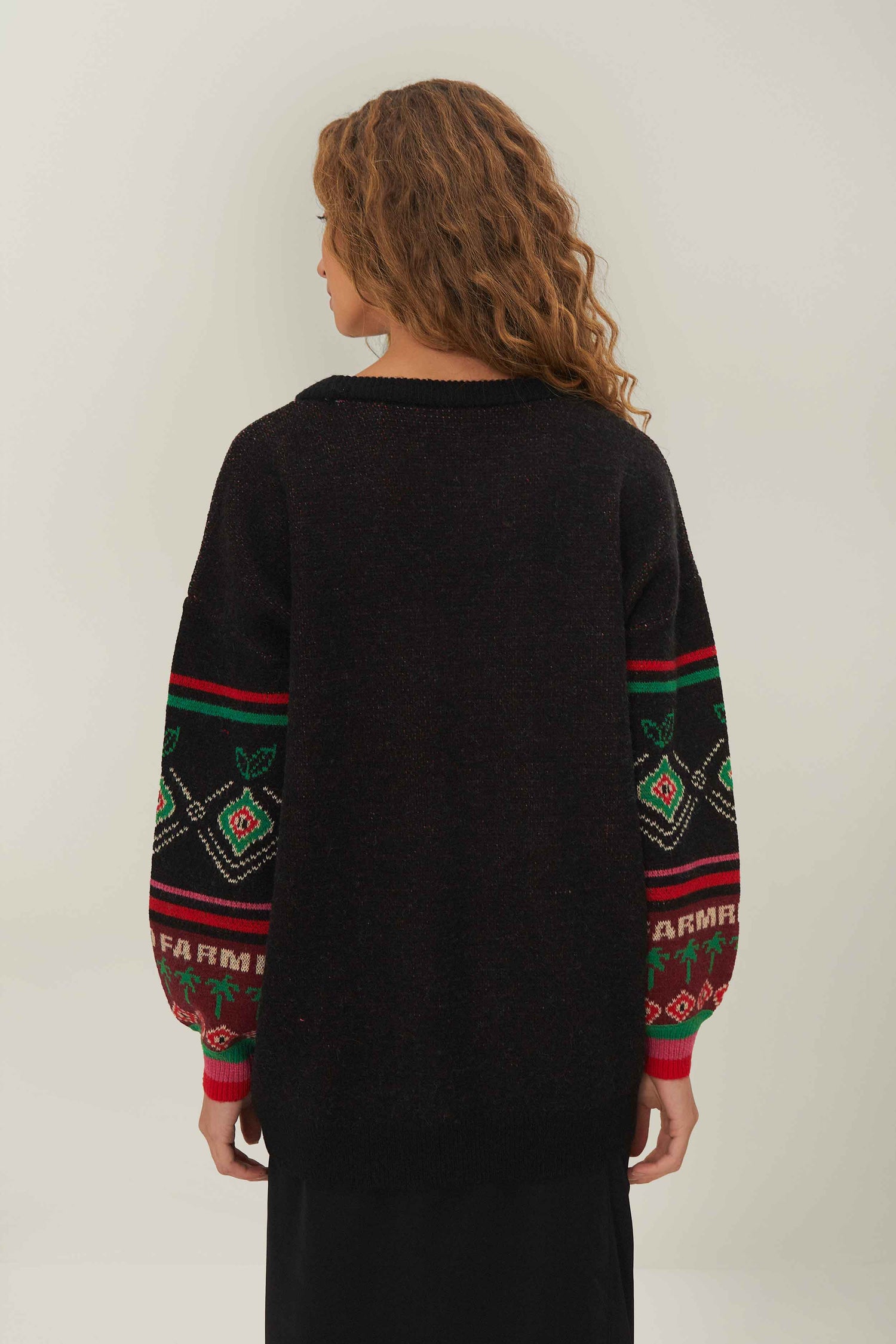 FARM Rio model wearing the Black Hohoho Knit Sweater