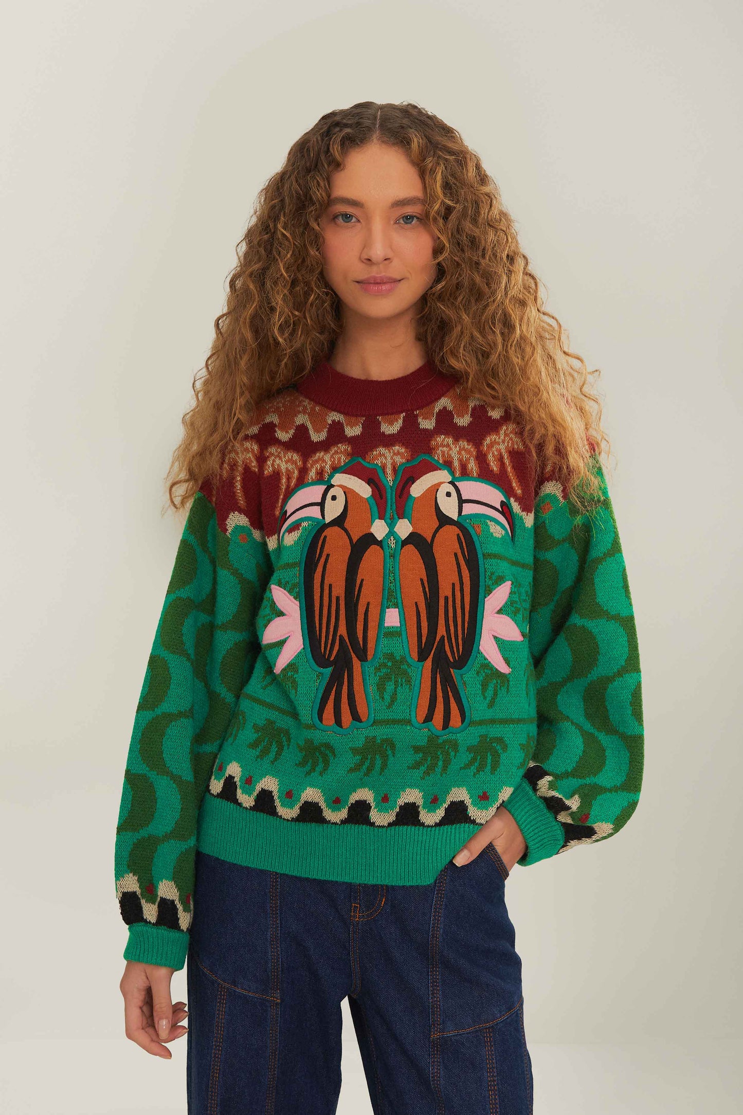 FARM Rio model wearing the Green Christmas Toucans Knit Sweater