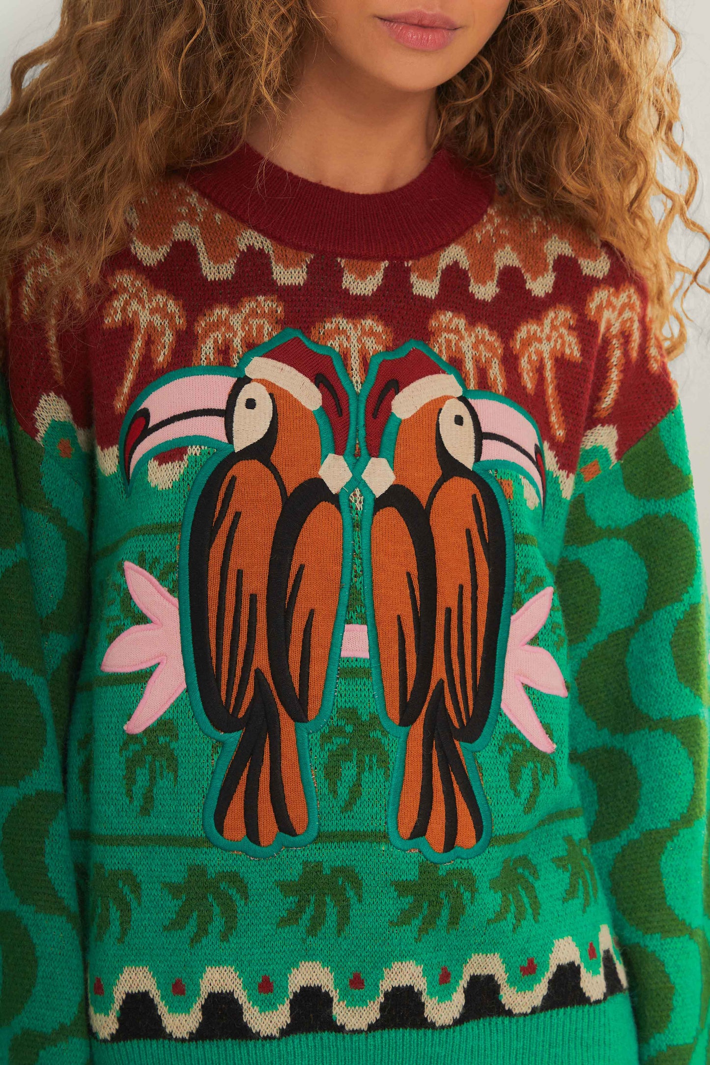 FARM Rio model wearing the Green Christmas Toucans Knit Sweater