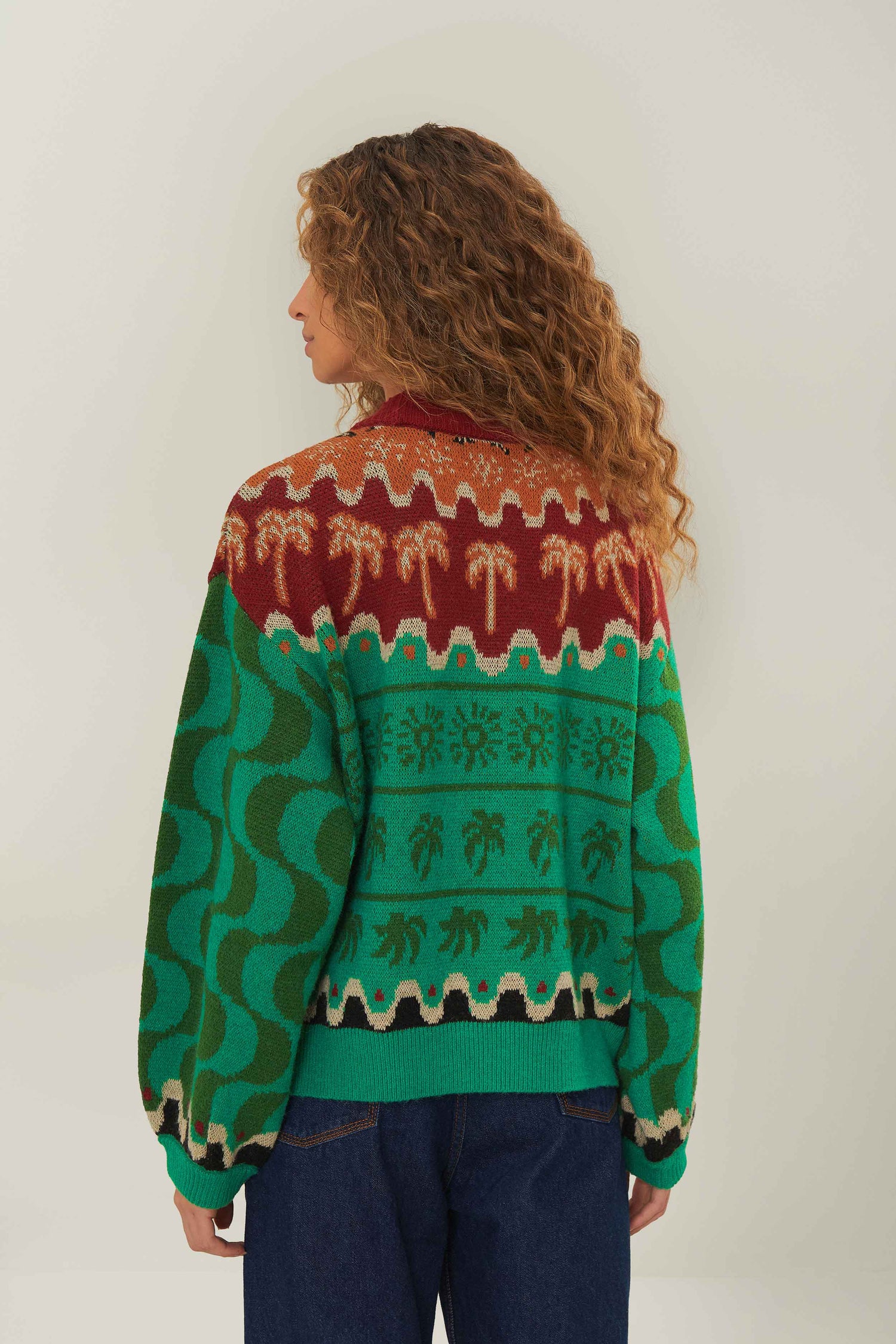 FARM Rio model wearing the Green Christmas Toucans Knit Sweater
