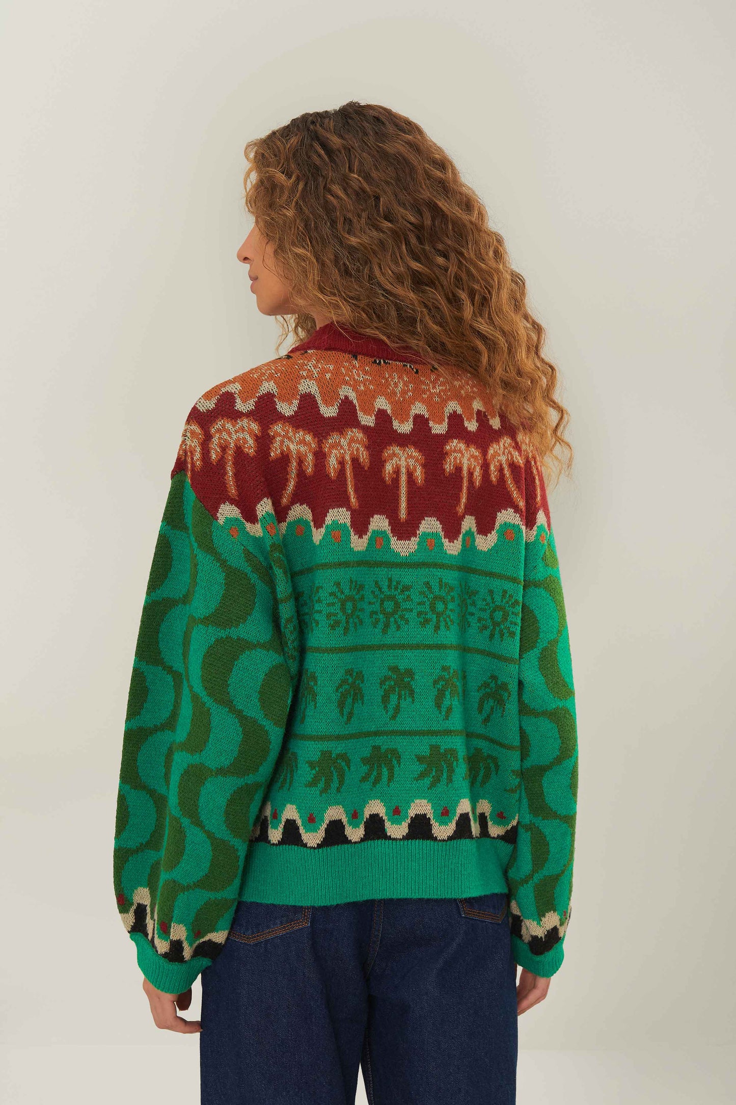 FARM Rio model wearing the Green Christmas Toucans Knit Sweater