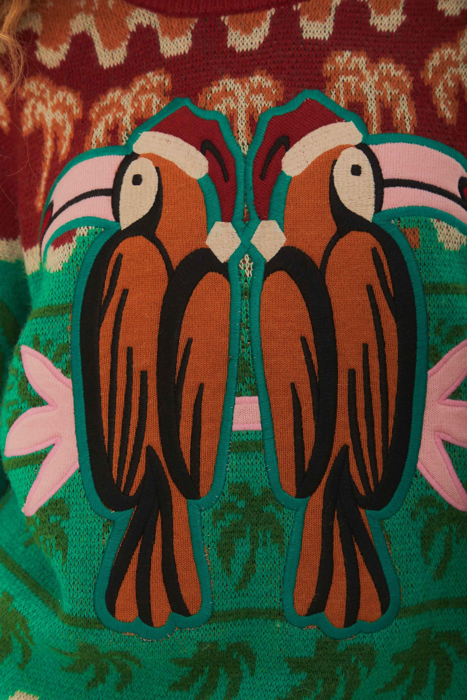 FARM Rio model wearing the Green Christmas Toucans Knit Sweater