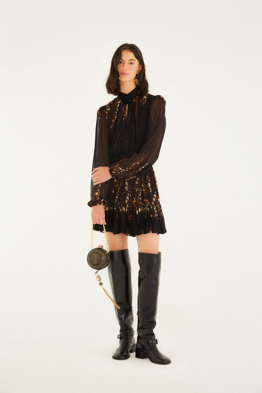 FARM Rio model wearing the Garden Silhouette Black Long Sleeve Mini Dress