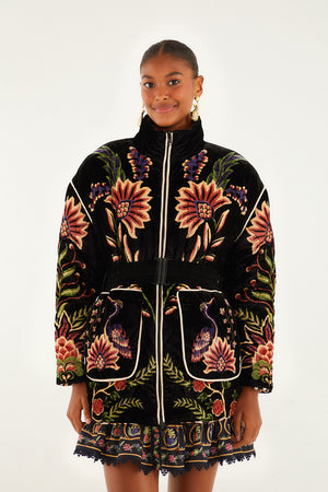 FARM Rio model wearing the black marvelous garden puffer jacket