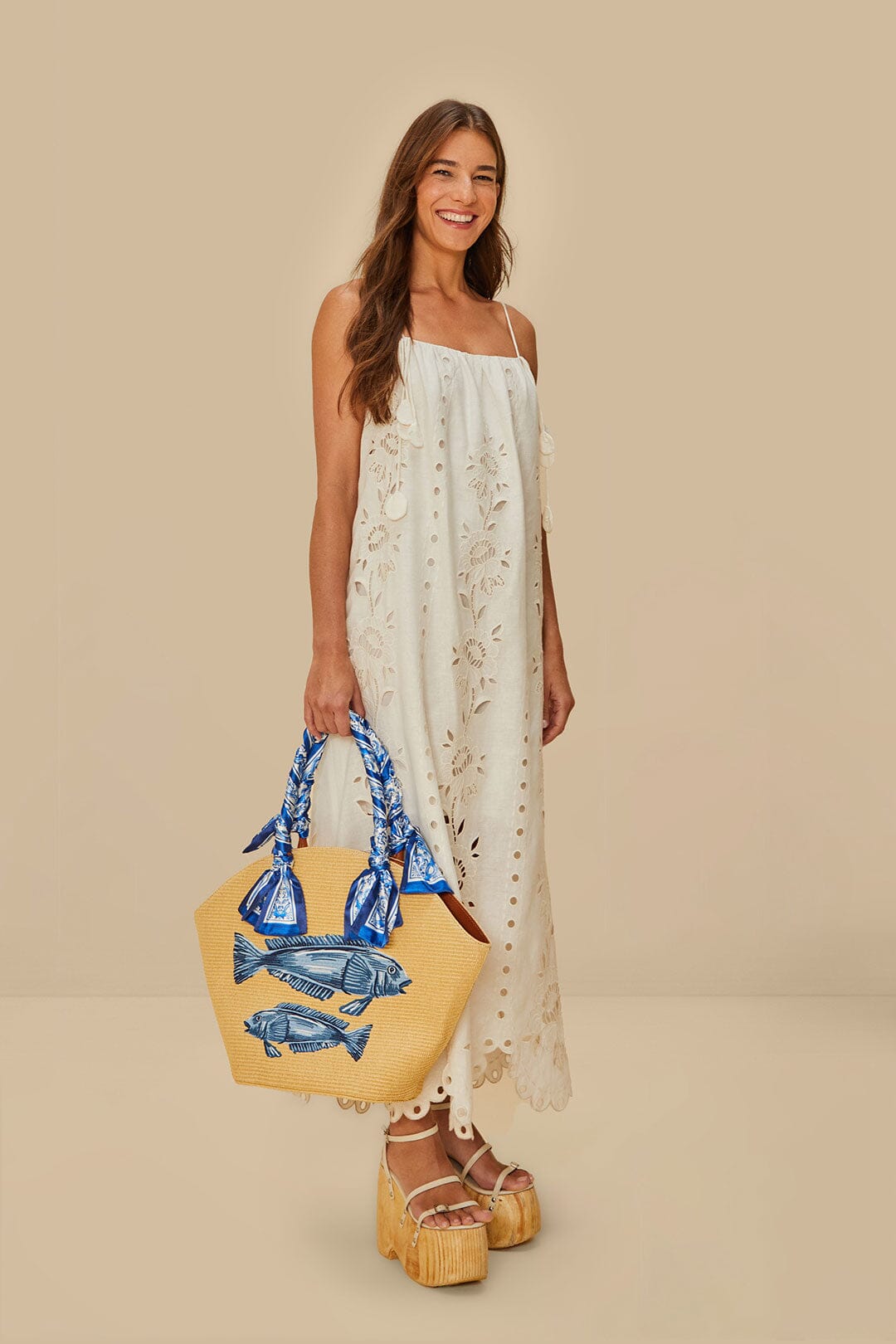 FARM Rio model wearing the Blue Garden Tiles Raffia Shell Tote