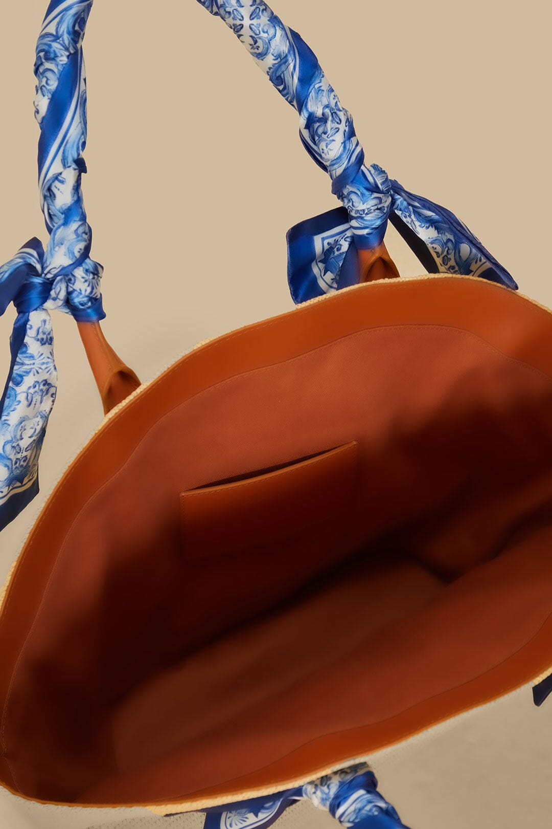 FARM Rio model wearing the Blue Garden Tiles Raffia Shell Tote