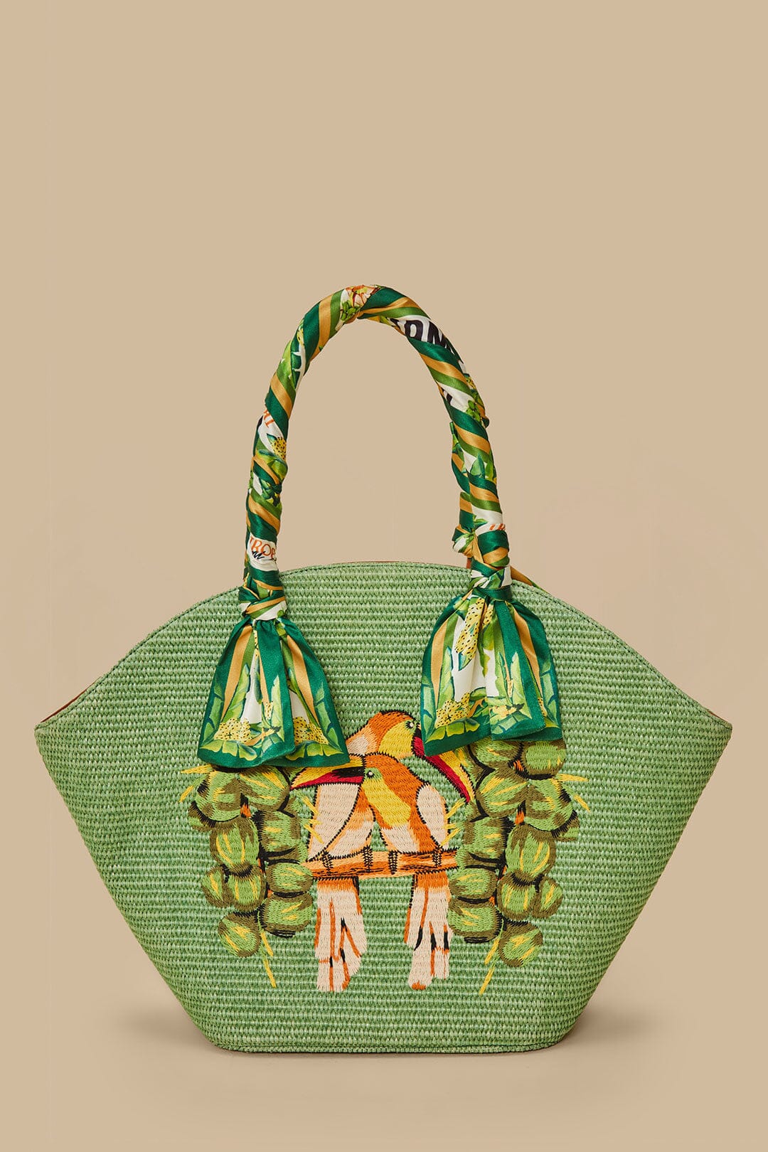 FARM Rio model wearing the Green Coconut Toucan Raffia Shell Tote