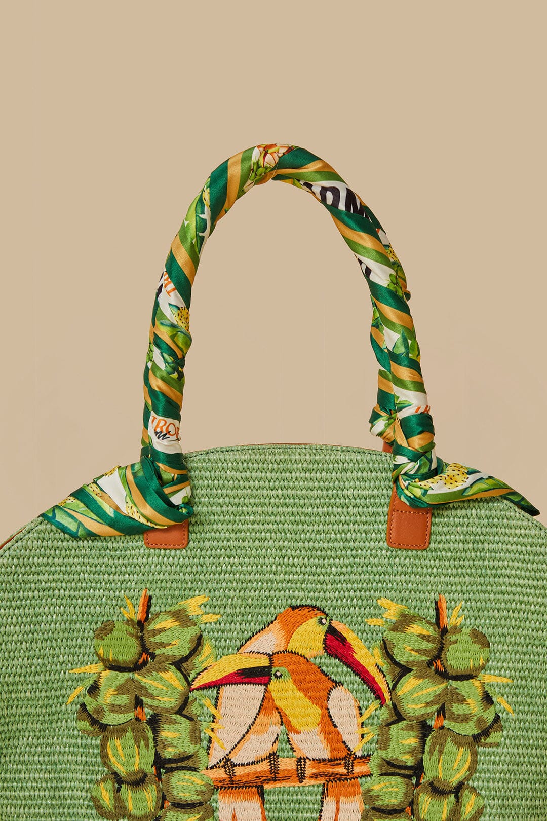 FARM Rio model wearing the Green Coconut Toucan Raffia Shell Tote