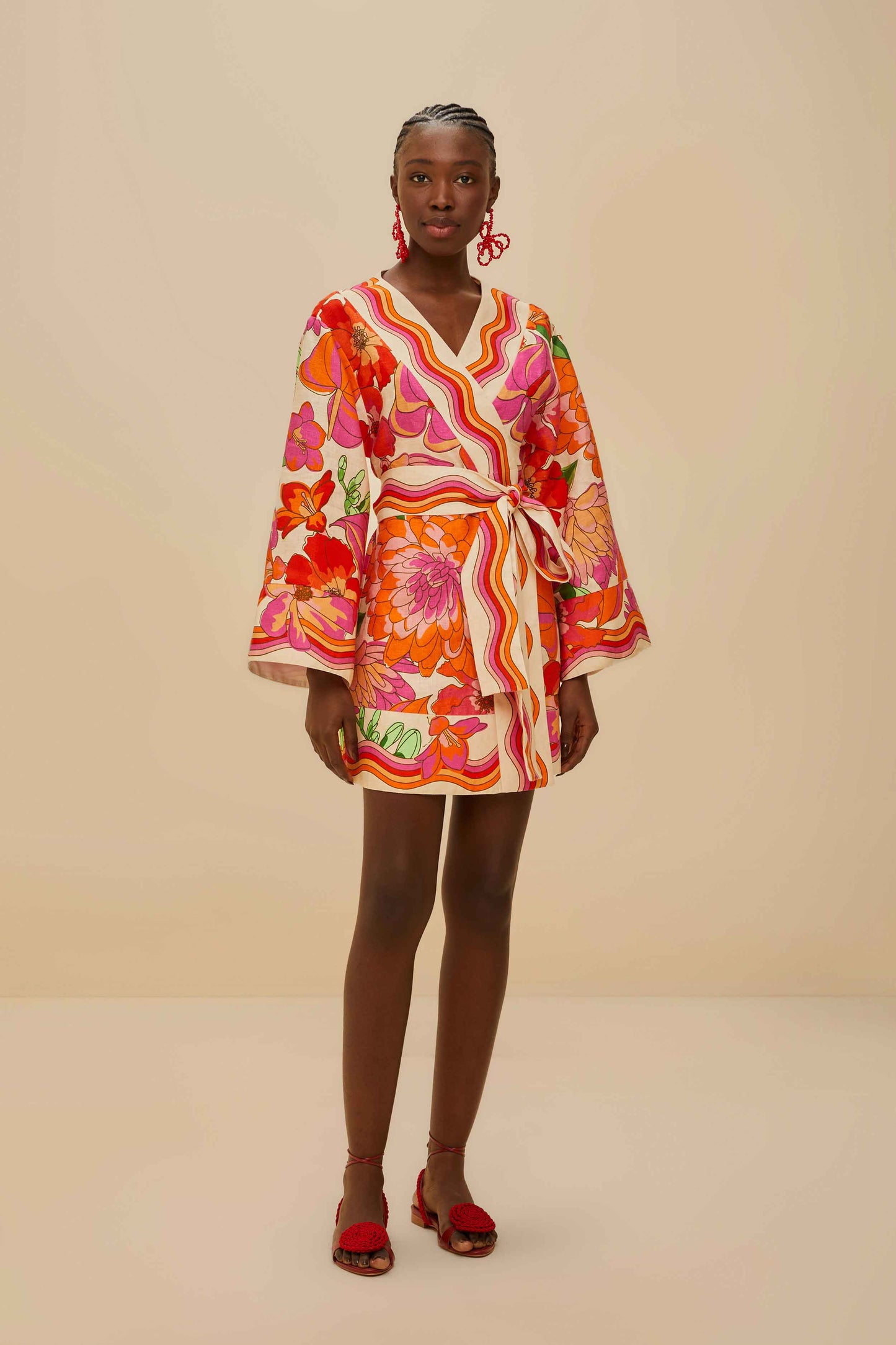 FARM Rio model wearing the Spring Affair Beige Mini Dress