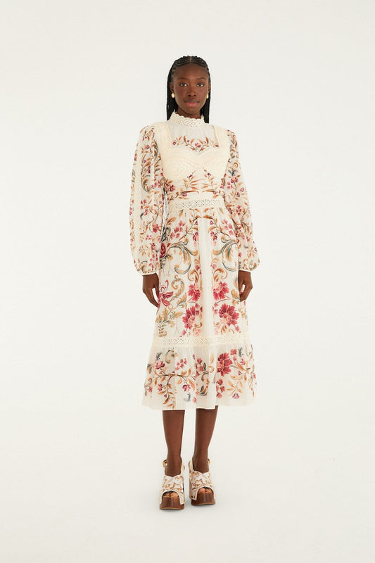 FARM Rio model wearing the Cream Royal Garden Long Sleeve Crochet Midi Dress