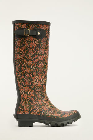 FARM Rio model wearing the Barbour x Farm Rio Cami Wellingtons