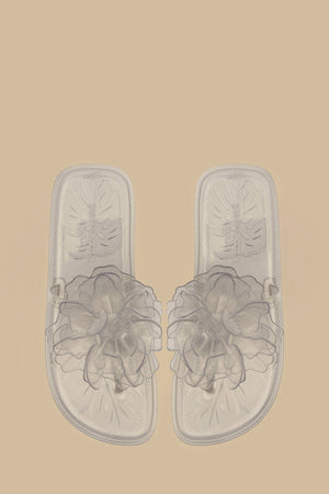 FARM Rio model wearing the Ivory Flower Jelly Flat Sandal