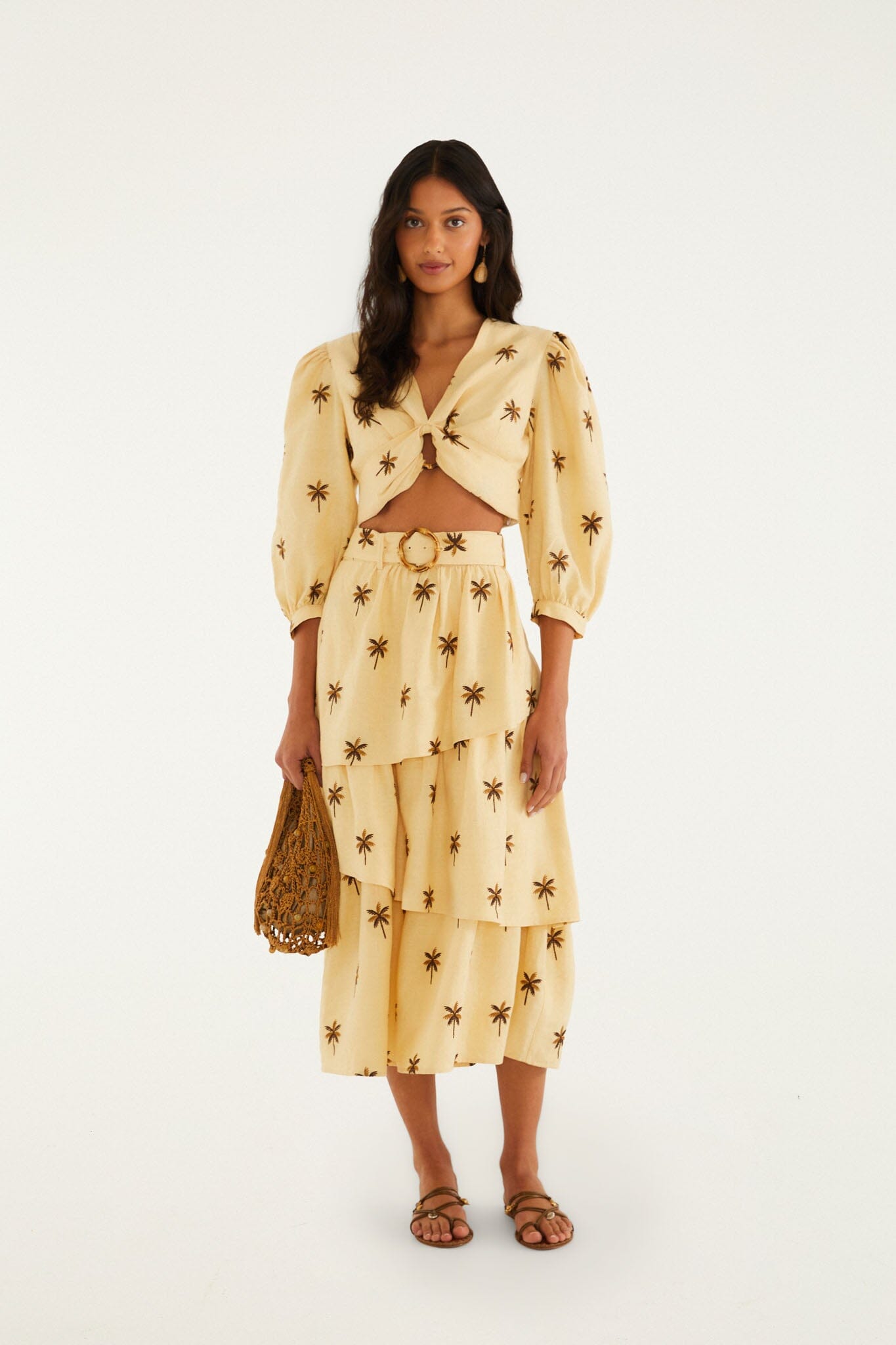 FARM Rio model wearing the Sand Embroidered Trees Buckled Layered Midi Skirt