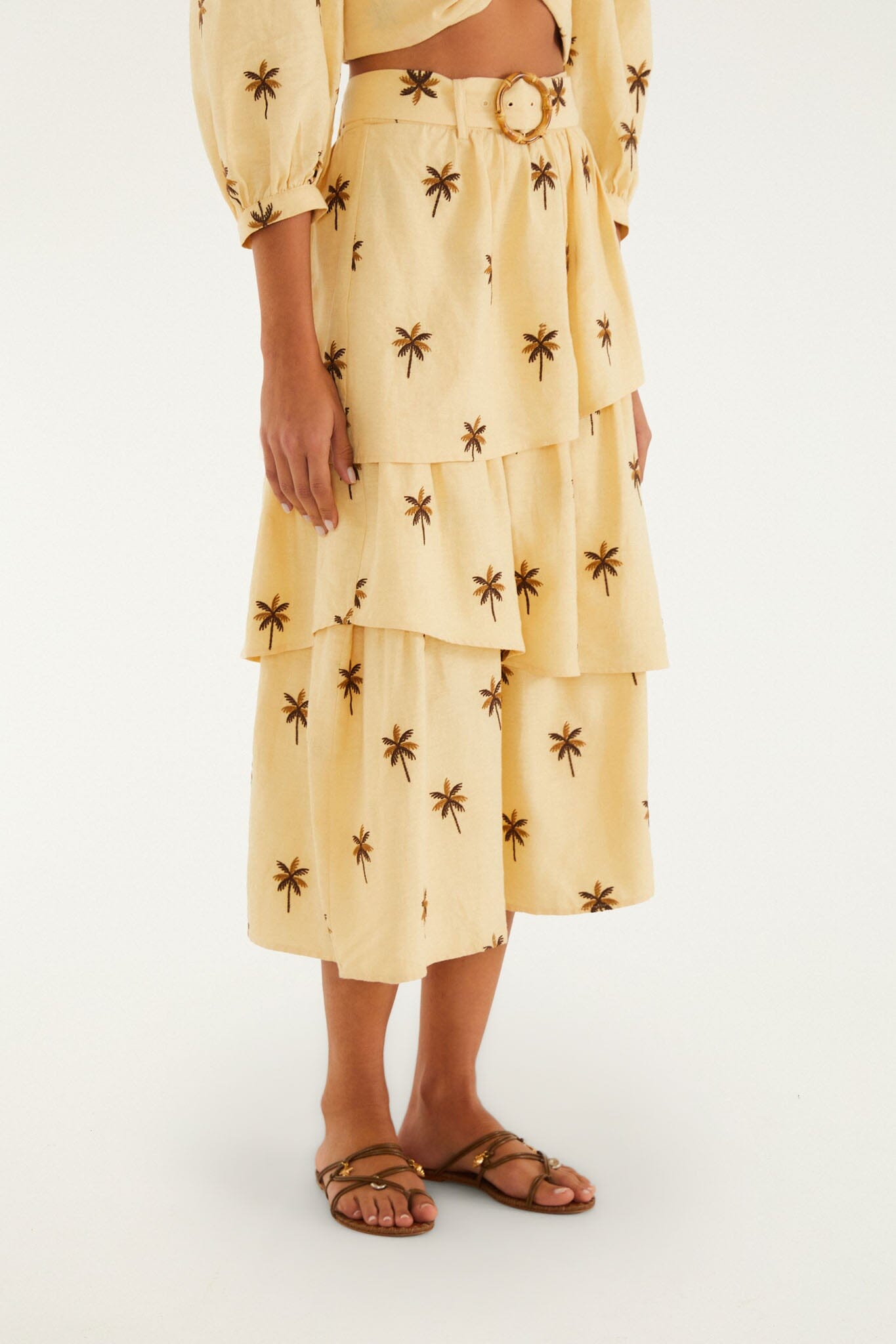 FARM Rio model wearing the Sand Embroidered Trees Buckled Layered Midi Skirt