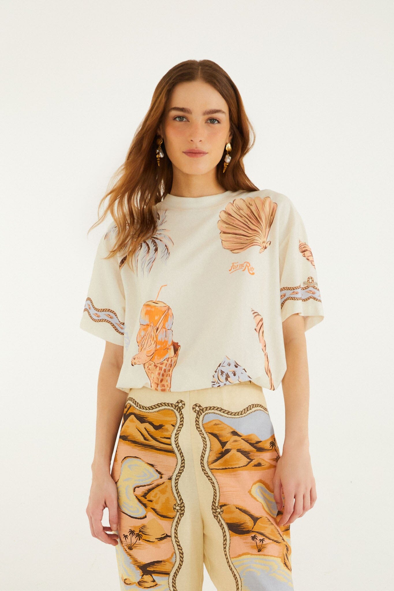 FARM Rio model wearing the Sand Rio Souvenir Short Sleeve T-Shirt