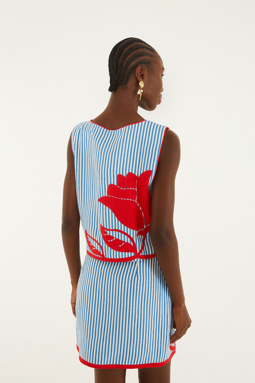FARM Rio model wearing the Sky Stripes Blue Mini Skirt