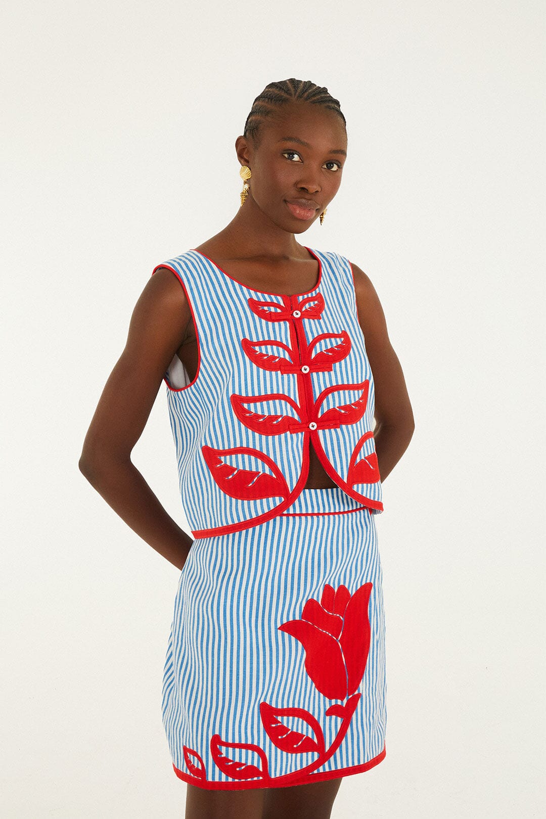 FARM Rio model wearing the Sky Stripes Blue Mini Skirt